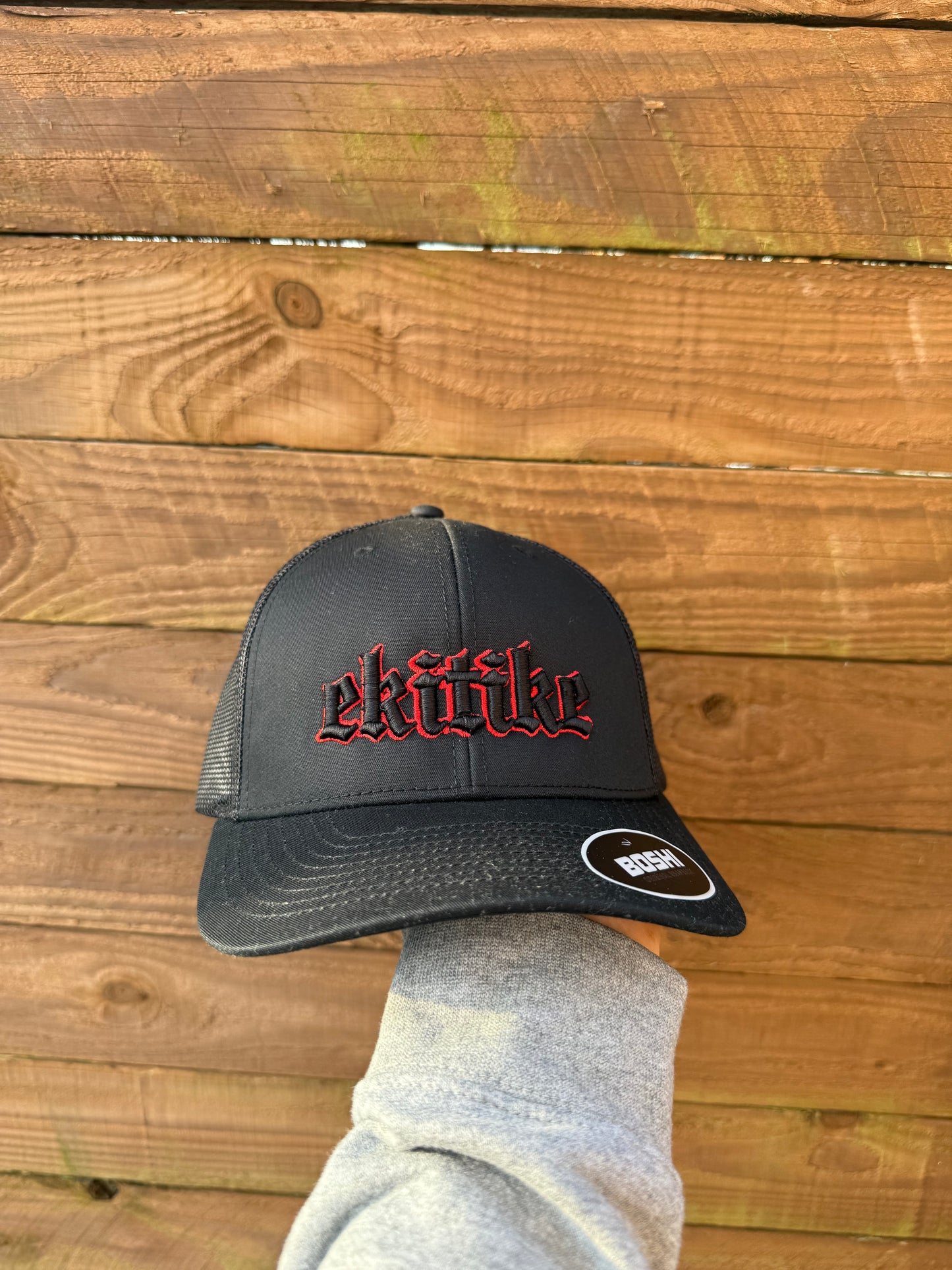 a Black Ekitike Cap